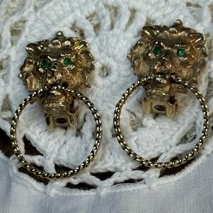 Vintage Earrings lion door knocker Gold Tone with green stones in eyes.